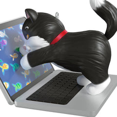 Mischievous Kittens, 27th in the Series — 2025 Hallmark Keepsake Christmas Ornament, black-and-white cat reaching for fish on laptop screen, angled view