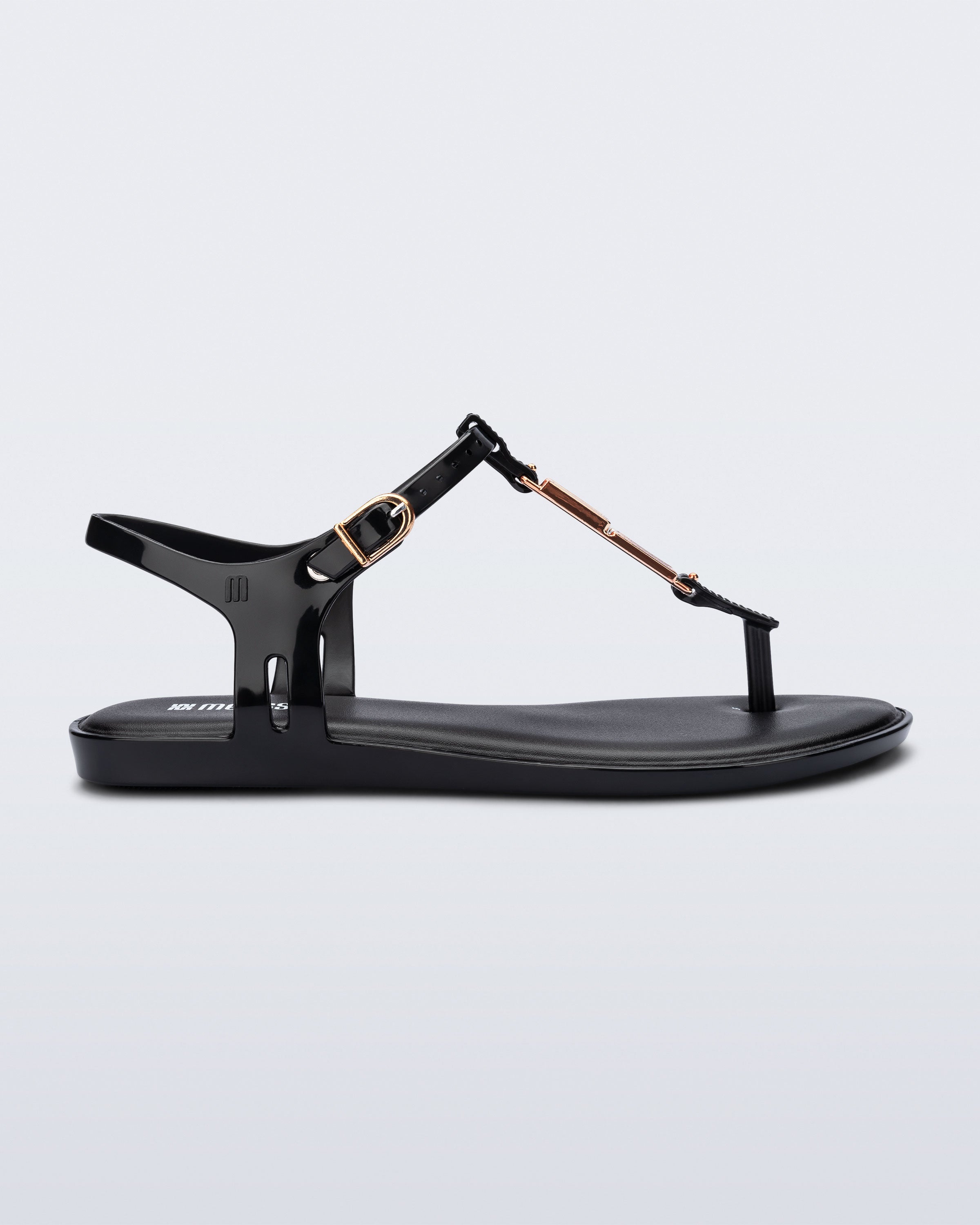 Side view of a black Solar M Chic sandal