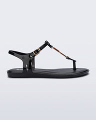 Side view of a black Solar M Chic sandal